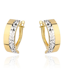Gold earrings decorated with white gold and diamond cutting
