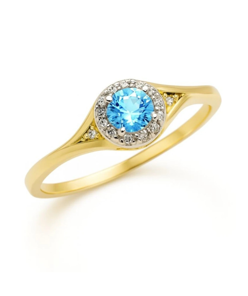 Gold engagement ring blue stone