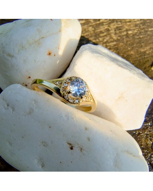 Gold engagement ring blue stone