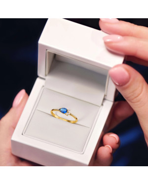 Blue stone in 8k gold ring