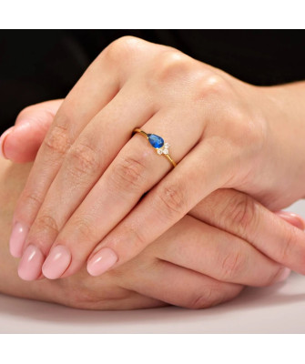 Blue stone in 8k gold ring