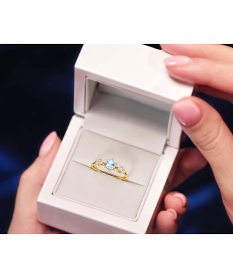 Ring with a large blue stone