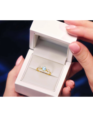 Ring with a large blue stone