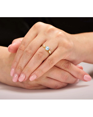 Ring with a large blue stone