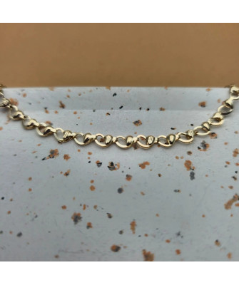 Gold bracelet adorned with hearts