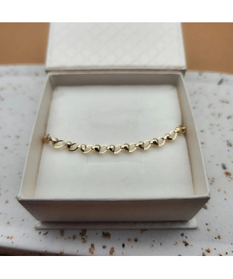 Gold bracelet adorned with hearts