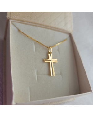 Golden cross adorned with diamond cutting