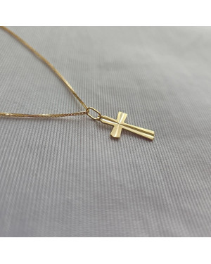 Golden cross adorned with diamond cutting