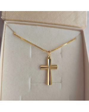 Golden cross adorned with diamond cutting