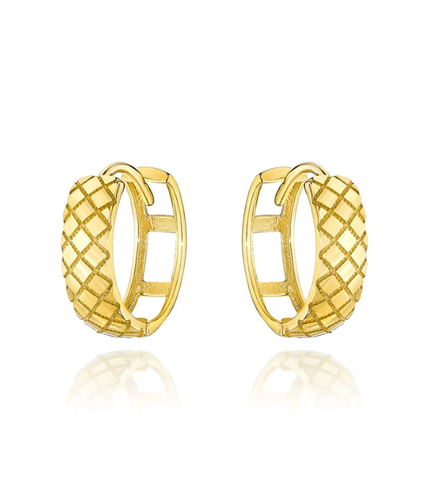 Gold earrings delicately decorated on large hoop