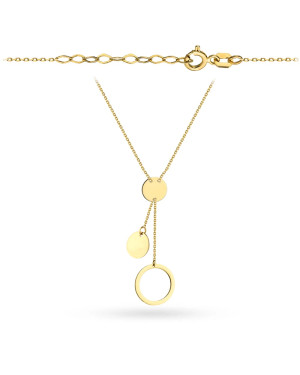 Gold necklace with full circles and a lariat ring