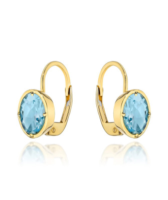 14k gold earrings with an oval stone in Topaz color