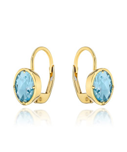 14k gold earrings with an oval stone in Topaz color