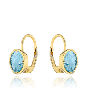14k gold earrings with an oval stone in Topaz color