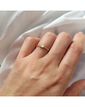 14k gold ring with a white stone