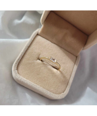 14k gold ring with a white stone