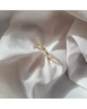 14k gold ring with a white stone