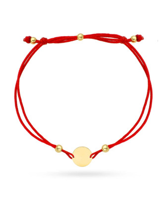 Gold circle and beads bracelet on a red string