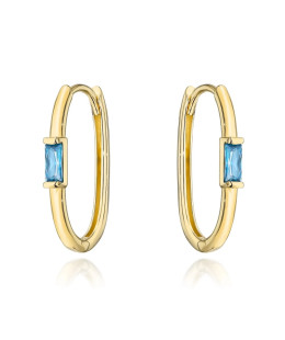 Gold earrings with a central blue stone