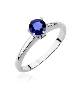Gold ring with sapphire white gold