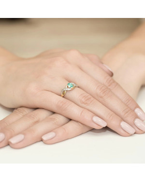 14k gold ring interwoven emerald diamonds