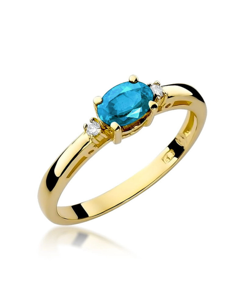 Topaz pierścionek złoty diamenty