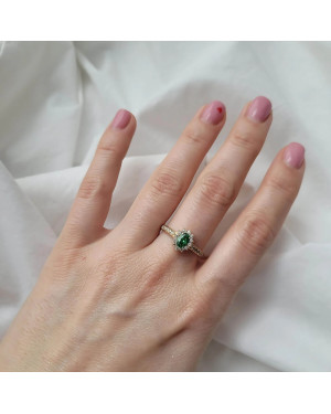 Gold engagement ring green stone