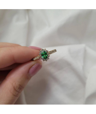 Gold engagement ring green stone