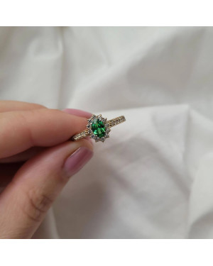 Gold engagement ring green stone