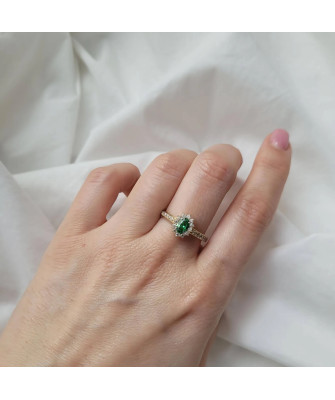 Gold engagement ring green stone