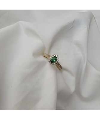 Gold engagement ring green stone