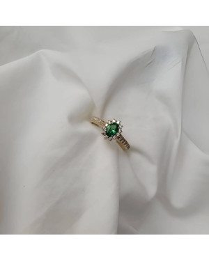 Gold engagement ring green stone