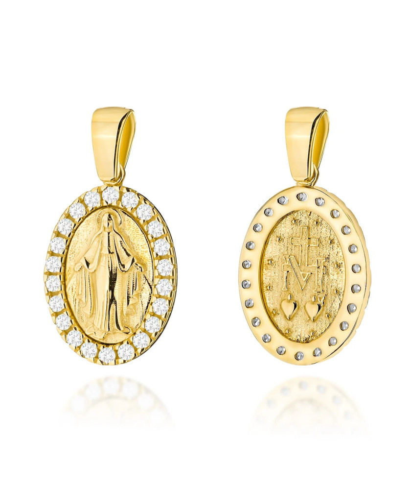 Miraculous golden medal in a zirconia setting