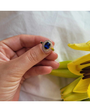 Ring with a large 8k blue stone