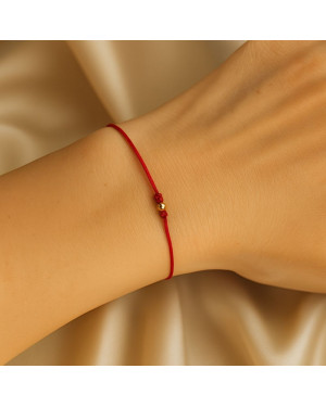 Gold string bracelet for the hand Circle with a star