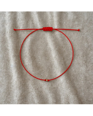 Gold string bracelet for the hand Circle with a star