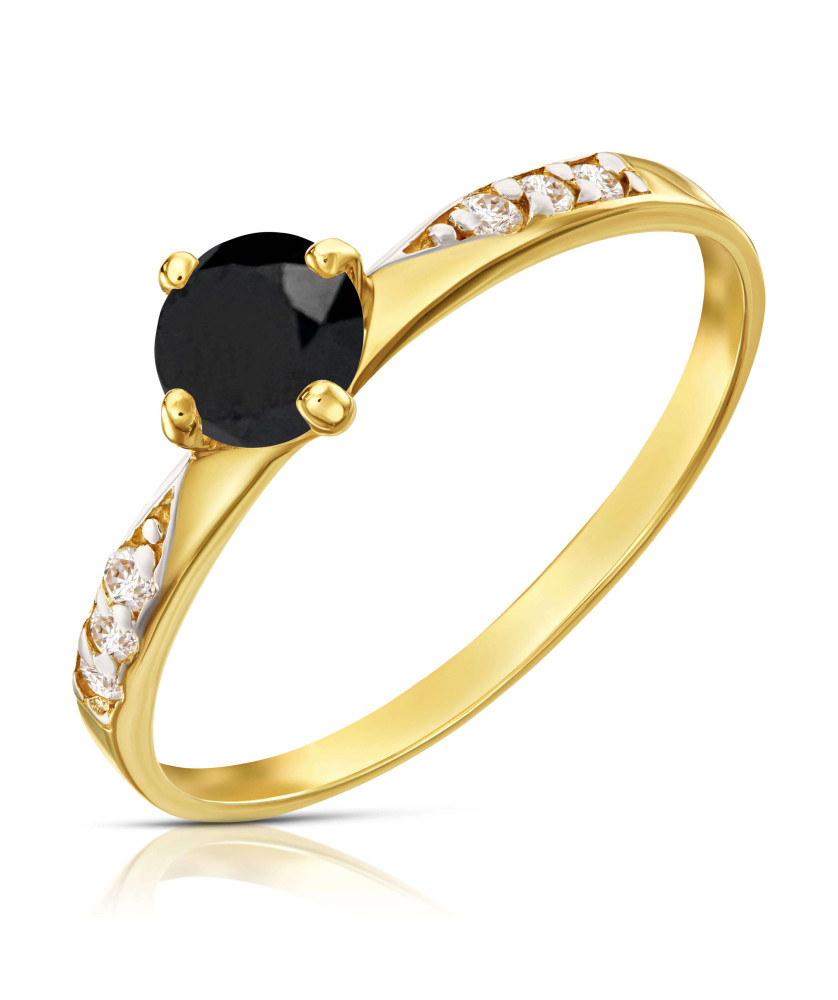 Gold engagement ring with black stone