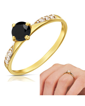 Gold engagement ring with black stone