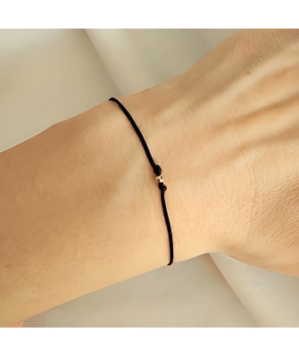 Gold string bracelet for the hand Circle with a star