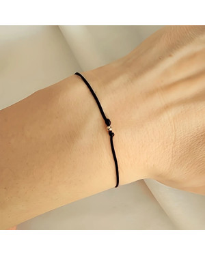 Gold string bracelet for the hand Circle with a star