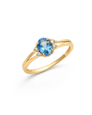 14k gold ring with a large blue stone