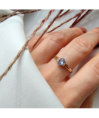 14k gold ring with a large blue stone