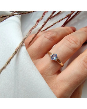 14k gold ring with a large blue stone