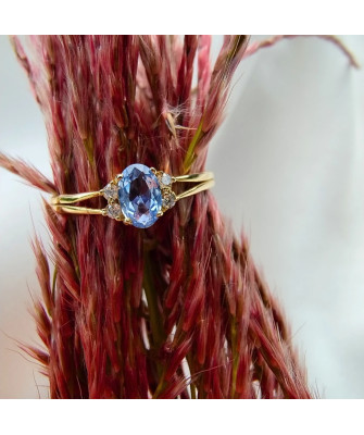 14k gold ring with a large blue stone