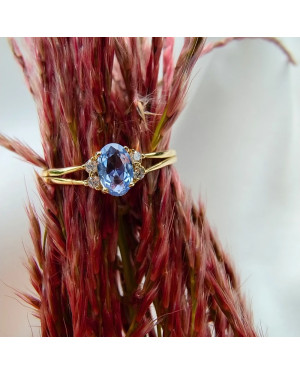 14k gold ring with a large blue stone