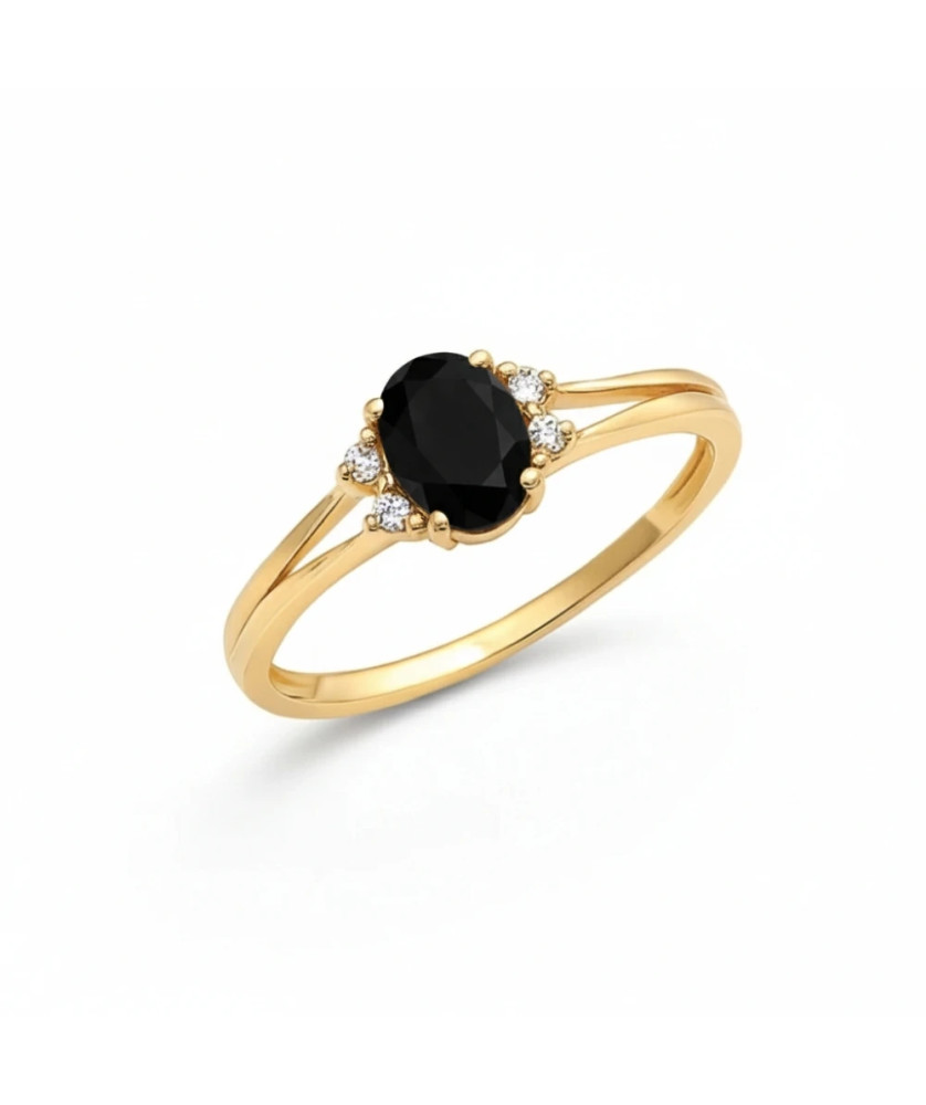 14k gold ring with a large blue stone