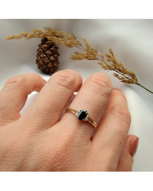 14k gold ring with a large blue stone