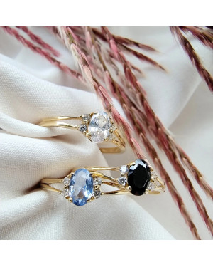 14k gold ring with a large blue stone
