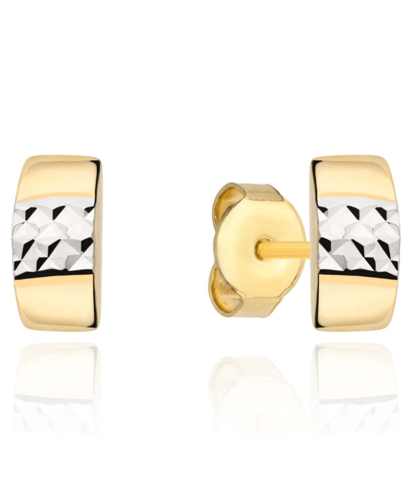 Diamond earrings in two colors of gold on a post